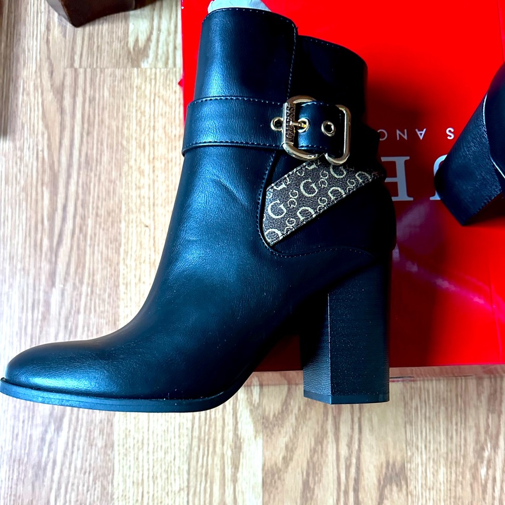 nwt and box sexy guess boots. black with brown logo. sz 8